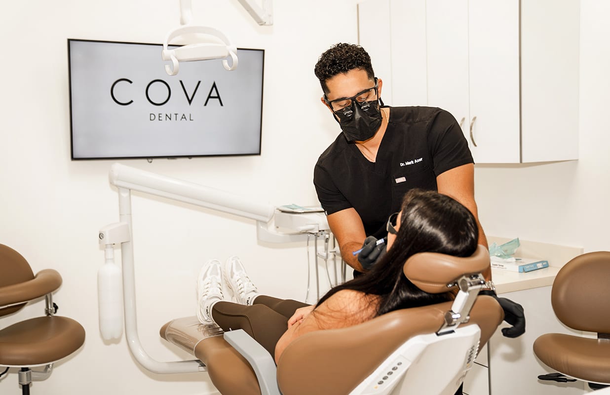 Cooper City emergency dentist consulting with a patient